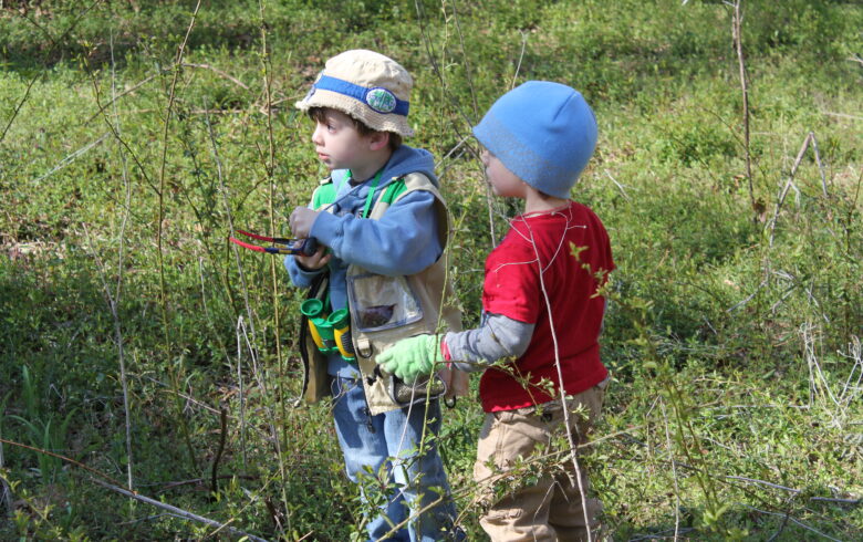 Kids explore the meadow at Gateway
