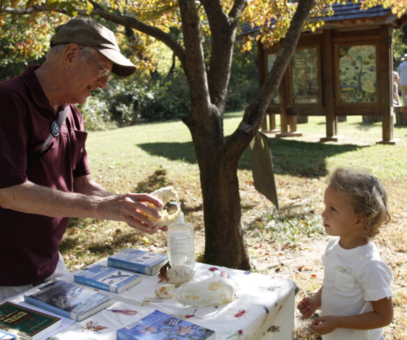 A man and child discuss natural history at Gateway Nature Preserve